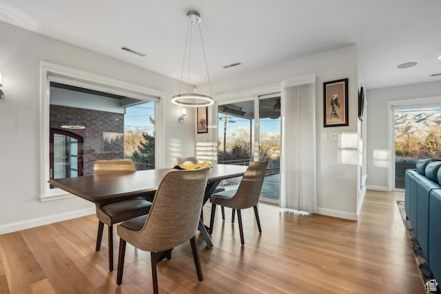 5419 S Kenwood Dr E, Salt Lake City, UT 84107 - dining area featuring light wood-style flooring and baseboards