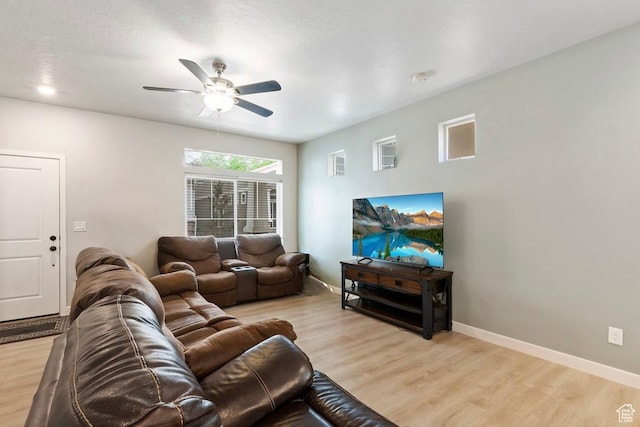 214 E Allegheny Pl S, Saratoga Springs, UT 84045 - living room with ceiling fan, light wood-type flooring, and baseboards