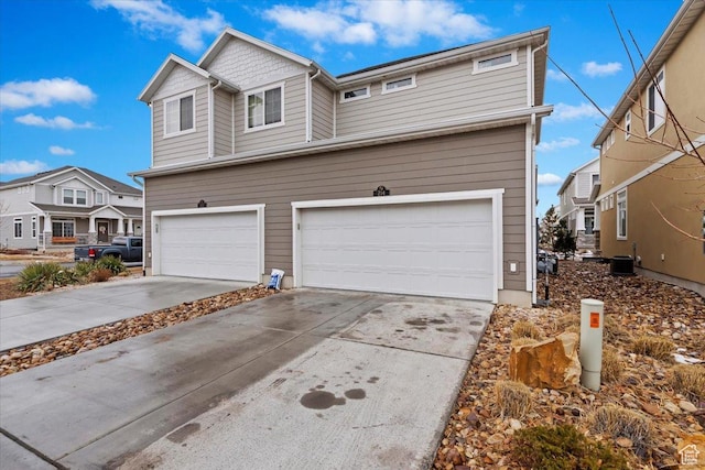 214 E Allegheny Pl S, Saratoga Springs, UT 84045 - view of front facade featuring driveway, an attached garage, central AC unit, and a residential view