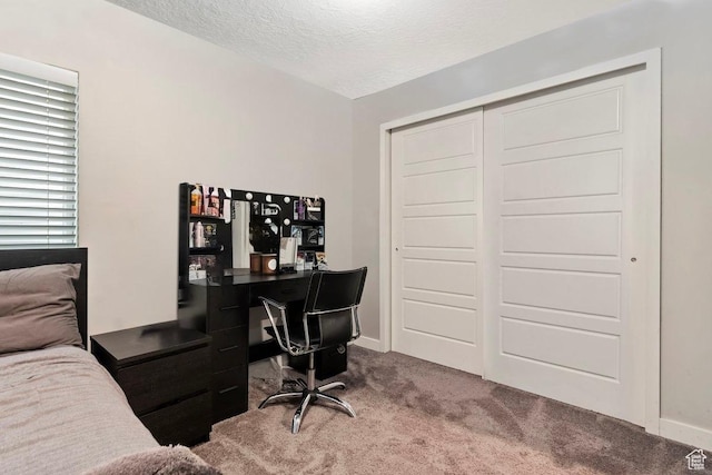 214 E Allegheny Pl S, Saratoga Springs, UT 84045 - carpeted bedroom with a textured ceiling, a desk, a closet, and baseboards