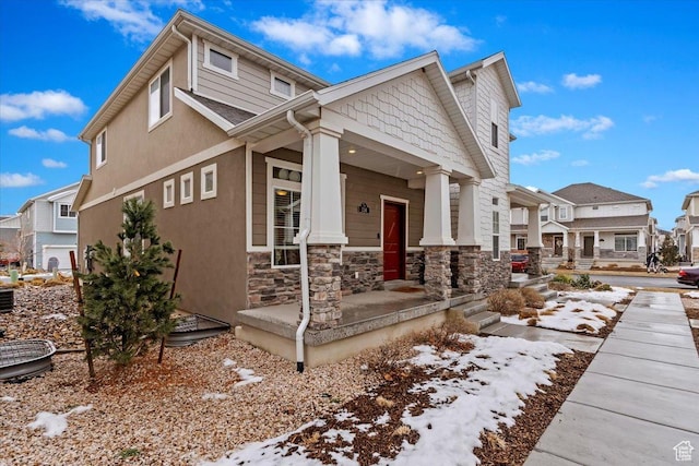 214 E Allegheny Pl S, Saratoga Springs, UT 84045 - view of front facade with a residential view, covered porch, and stone siding