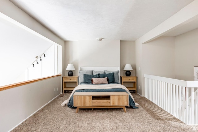 426 E Creekside Cir Unit E, Murray, UT 84107 - bedroom featuring light carpet and baseboards