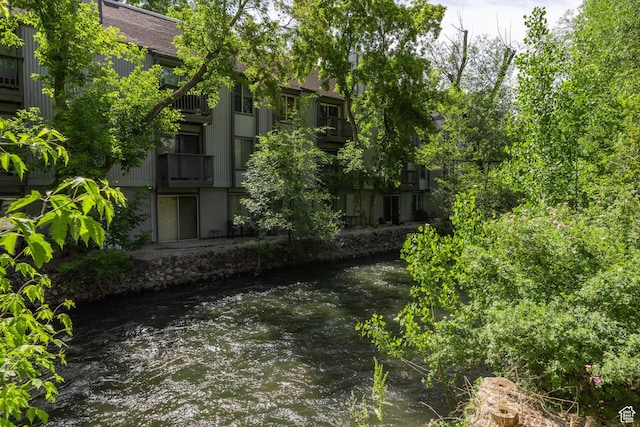 426 E Creekside Cir Unit E, Murray, UT 84107 - view of yard featuring a water view