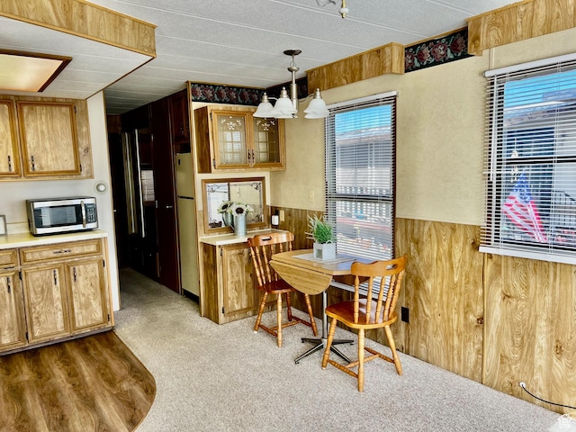 1160 E Telegraph St Unit 213, Washington, UT 84780 - carpeted dining room with wooden walls