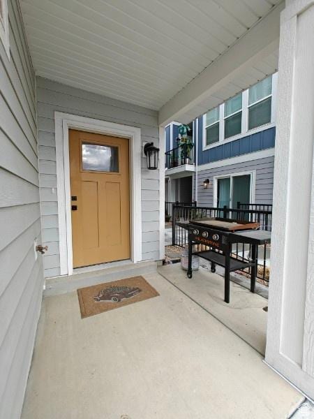 3469 S Bellrock Pl E Unit 5, South Salt Lake, UT 84115 - doorway to property with covered porch