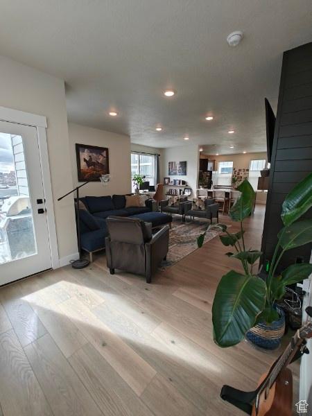 3469 S Bellrock Pl E Unit 5, South Salt Lake, UT 84115 - living room featuring light hardwood / wood-style floors