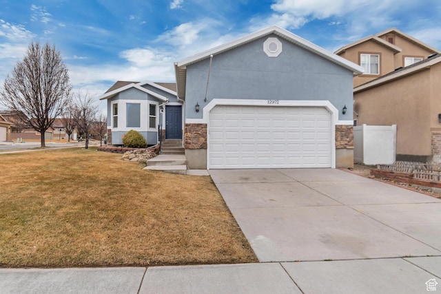 ranch-style house featuring stucco siding, concrete driveway, an attached garage, stone siding, and a front lawn