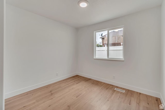 12972 S Cactus Berry Dr, Riverton, UT 84096 - unfurnished room with baseboards, visible vents, and light wood-style floors