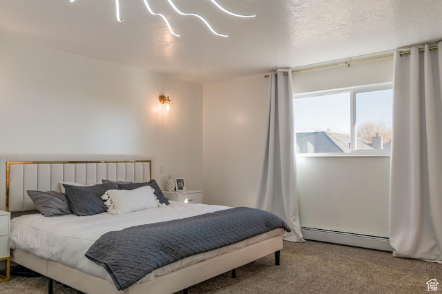 1105 S 500 W, Vernal, UT 84078 - bedroom with carpet, a textured ceiling, and a baseboard heating unit