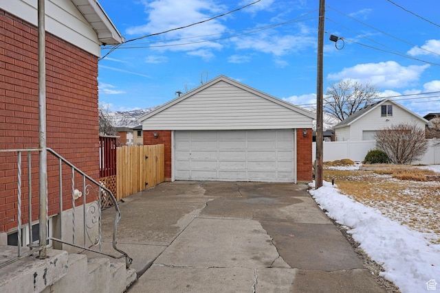 4868 S Ridgeline Dr, Washington Terrace, UT 84405 - view of snow covered garage
