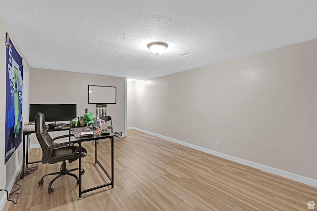 4868 S Ridgeline Dr, Washington Terrace, UT 84405 - office featuring a textured ceiling and light hardwood / wood-style flooring