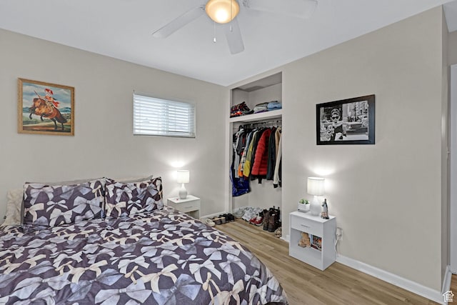 4868 S Ridgeline Dr, Washington Terrace, UT 84405 - bedroom featuring light hardwood / wood-style flooring, ceiling fan, and a closet