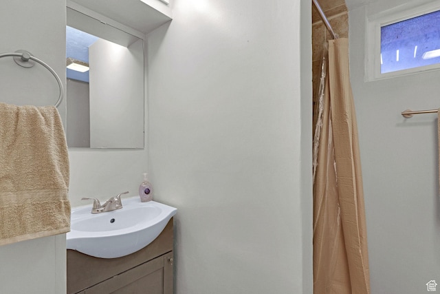 4868 S Ridgeline Dr, Washington Terrace, UT 84405 - bathroom featuring curtained shower and vanity