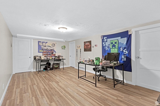 4868 S Ridgeline Dr, Washington Terrace, UT 84405 - office area with light hardwood / wood-style flooring and a textured ceiling