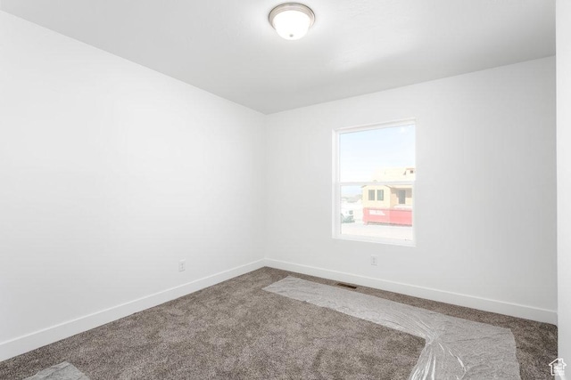 1152 W High Plains Dr Unit 612, Grantsville, UT 84029 - carpeted empty room featuring baseboards