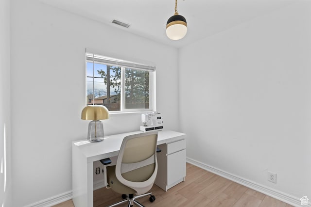 7581 S Birch St, Midvale, UT 84047 - home office with baseboards and light wood-type flooring