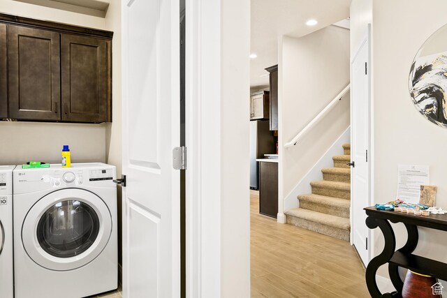 334 N 2020 W, Hurricane, UT 84737 - washroom featuring washing machine and dryer, cabinets, and light wood-type flooring