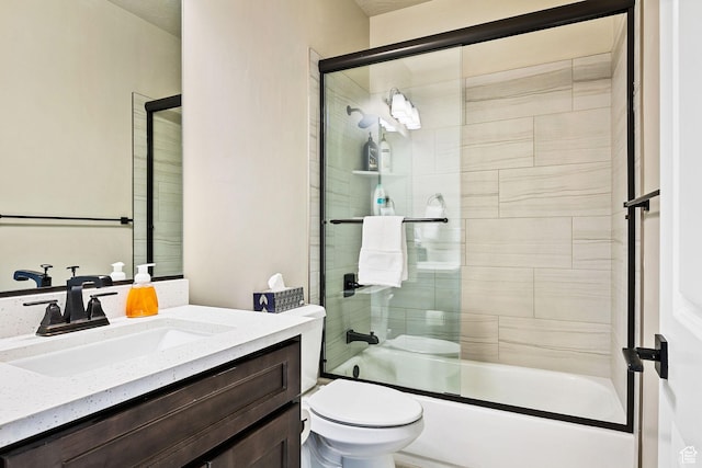 334 N 2020 W, Hurricane, UT 84737 - full bathroom featuring toilet, vanity, and bath / shower combo with glass door