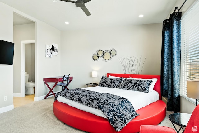 334 N 2020 W, Hurricane, UT 84737 - carpeted bedroom featuring connected bathroom and ceiling fan