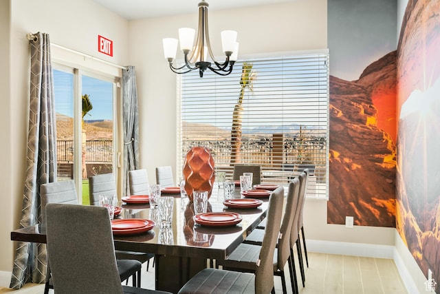 334 N 2020 W, Hurricane, UT 84737 - dining room featuring light hardwood / wood-style floors and an inviting chandelier