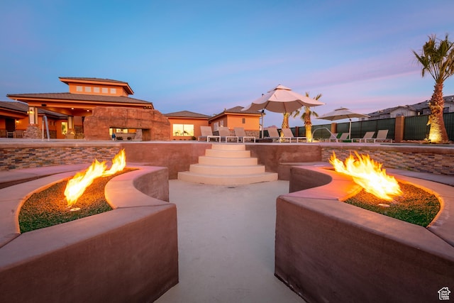 334 N 2020 W, Hurricane, UT 84737 - patio terrace at dusk featuring a fire pit