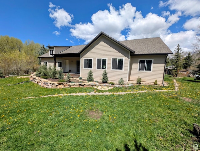 2326 Country Rd, Kamas, UT 84036 - rear view of house featuring a lawn