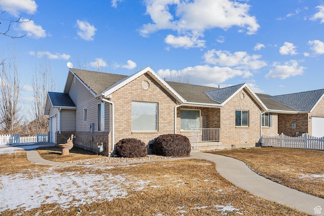 single story home with a garage