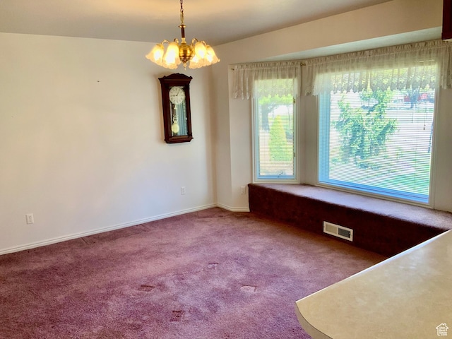 unfurnished dining area with a notable chandelier and carpet