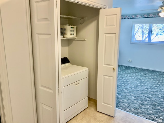 laundry room with washer / clothes dryer, light carpet, and ceiling fan