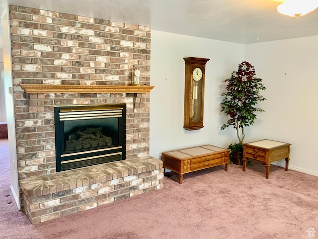 sitting room with carpet and a brick fireplace