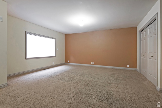 5845 Kerry Cir, Murray, UT 84107 - unfurnished bedroom with a closet and light colored carpet