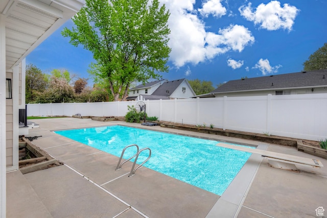 5845 Kerry Cir, Murray, UT 84107 - view of swimming pool featuring a diving board