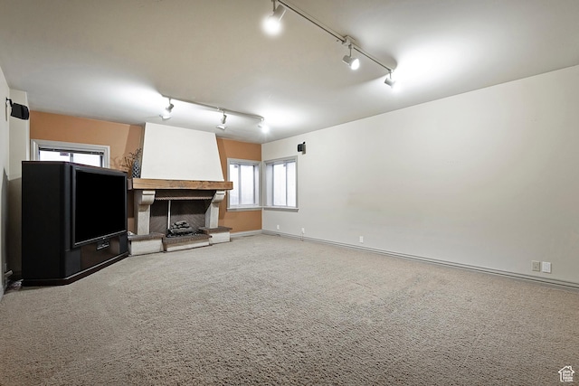 5845 Kerry Cir, Murray, UT 84107 - unfurnished living room featuring track lighting and carpet floors