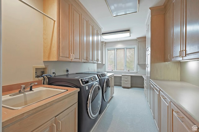 5845 Kerry Cir, Murray, UT 84107 - washroom with cabinets, washer and dryer, and sink