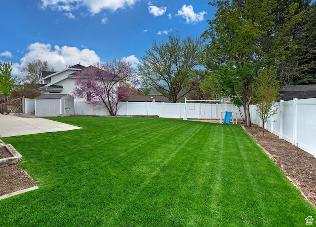 5845 Kerry Cir, Murray, UT 84107 - view of yard featuring a shed and a patio area