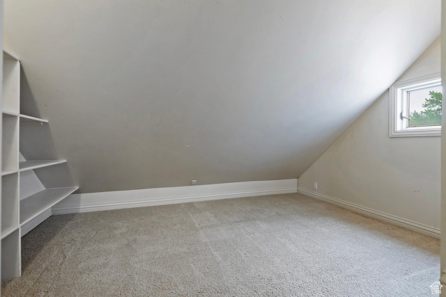 5845 Kerry Cir, Murray, UT 84107 - additional living space featuring lofted ceiling and carpet flooring