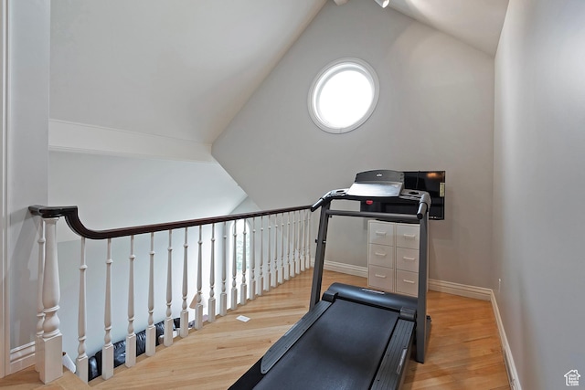 5845 Kerry Cir, Murray, UT 84107 - exercise room with hardwood / wood-style floors and vaulted ceiling