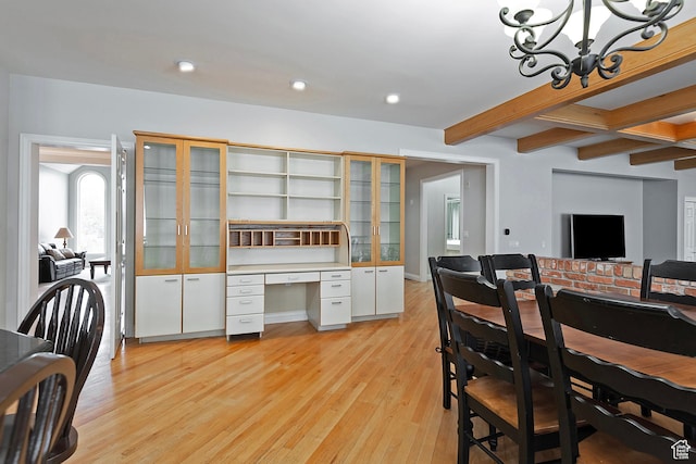 5845 Kerry Cir, Murray, UT 84107 - dining area featuring light wood-type flooring, an inviting chandelier, built in desk, and beamed ceiling