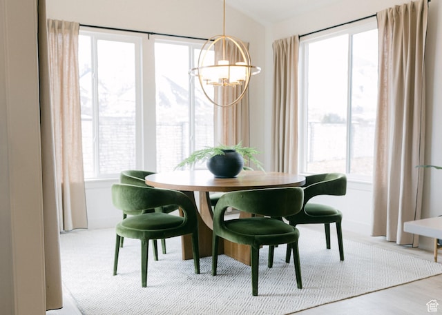 908 E 430 N Unit 18, Salem, UT 84653 - dining area featuring light wood-type flooring, vaulted ceiling, a chandelier, and a healthy amount of sunlight