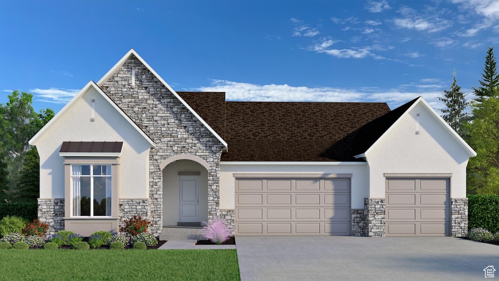 view of front of home with a garage