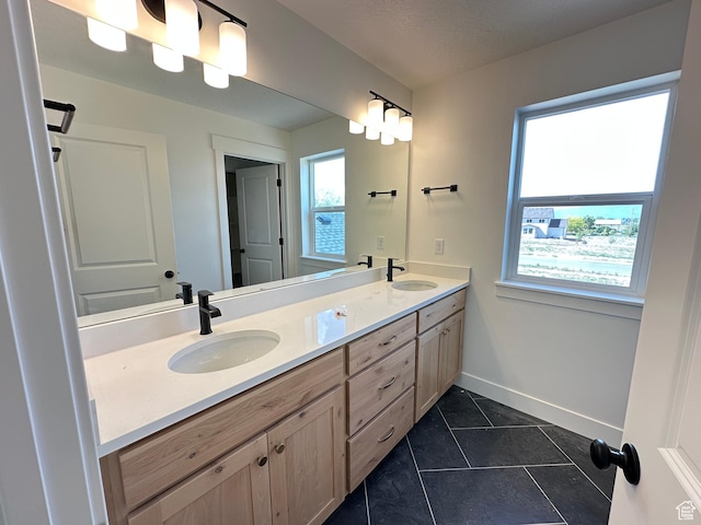 325 N 1040 E Unit 26, Salem, UT 84653 - full bath featuring double vanity, baseboards, and tile patterned floors