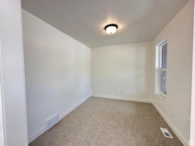 325 N 1040 E Unit 26, Salem, UT 84653 - carpeted empty room featuring a textured ceiling and baseboards