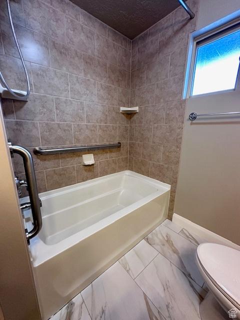 969 N 1200 W, Marriott Slaterville, UT 84404 - bathroom featuring toilet and tiled shower / bath