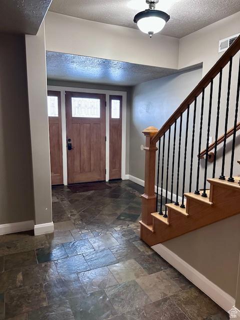 969 N 1200 W, Marriott Slaterville, UT 84404 - foyer entrance with a textured ceiling