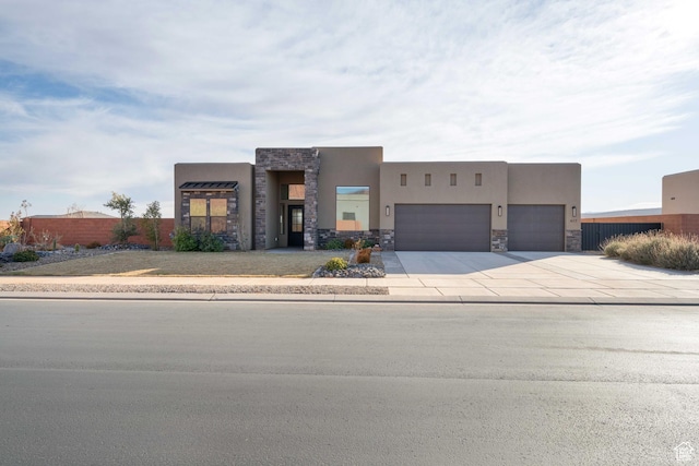 southwest-style home featuring a garage
