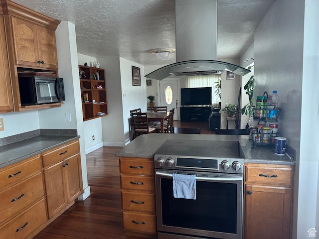 1135 S State St E, Salt Lake City, UT 84111 - kitchen with black microwave, island exhaust hood, stainless steel electric stove, and dark wood-style floors