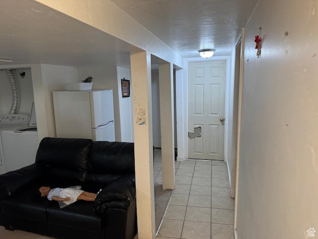 1135 S State St E, Salt Lake City, UT 84111 - hall with a textured ceiling, independent washer and dryer, and light tile patterned floors