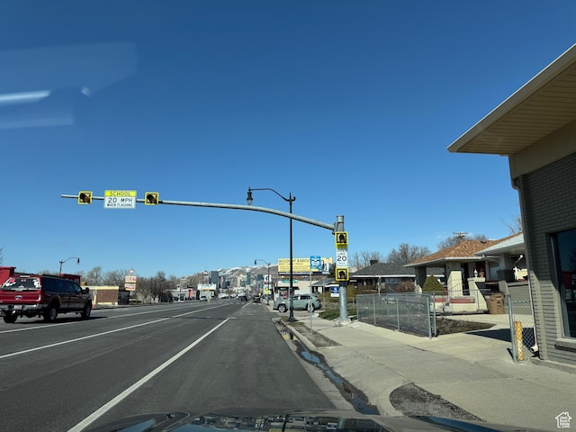 1135 S State St E, Salt Lake City, UT 84111 - view of street featuring street lighting, sidewalks, traffic lights, and curbs