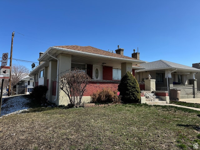 1135 S State St E, Salt Lake City, UT 84111 - bungalow-style house with a front lawn and a chimney