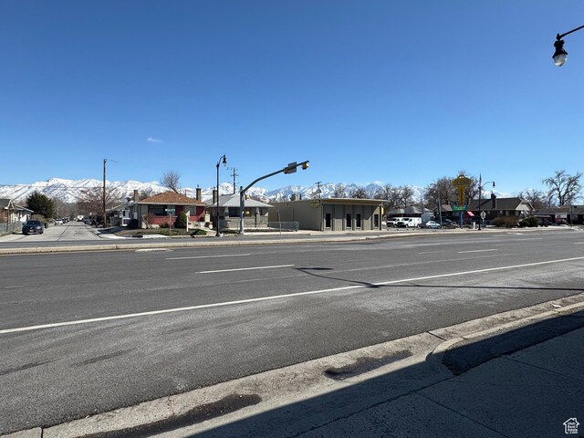 1135 S State St E, Salt Lake City, UT 84111 - view of road with street lighting, a residential view, sidewalks, and curbs
